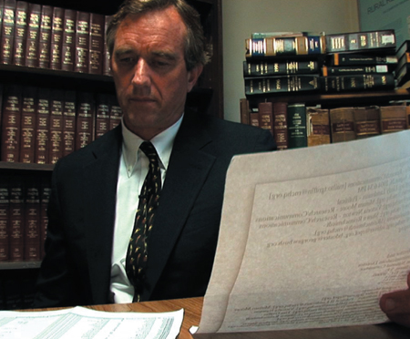 Robert F Kennedy Jr reviewing confidential voter caging evidence during this - photo 2