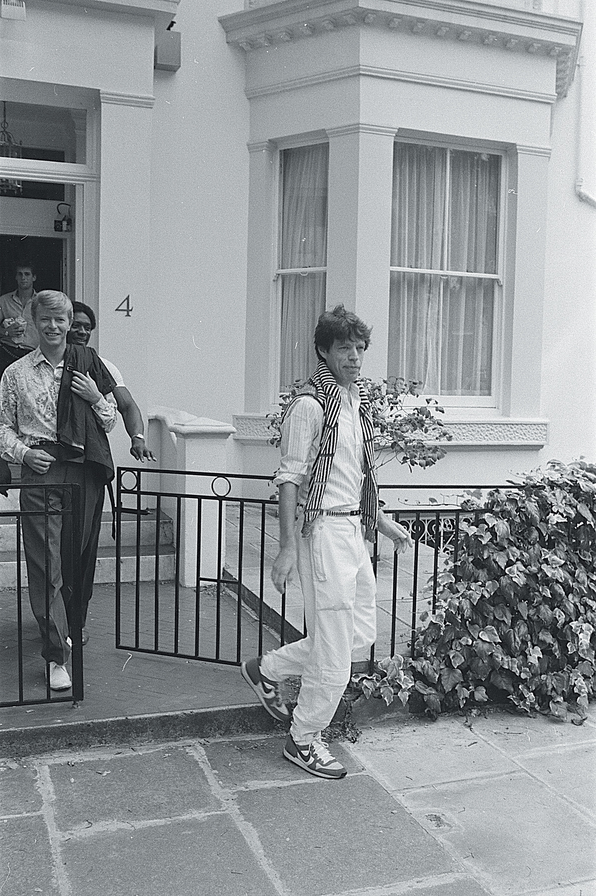 David and Mick Jagger after a birthday party the best of friends andaccording - photo 24