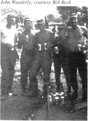 Alpha 17 machine gunners enjoying warm beer at An Khe left to right Edward - photo 22