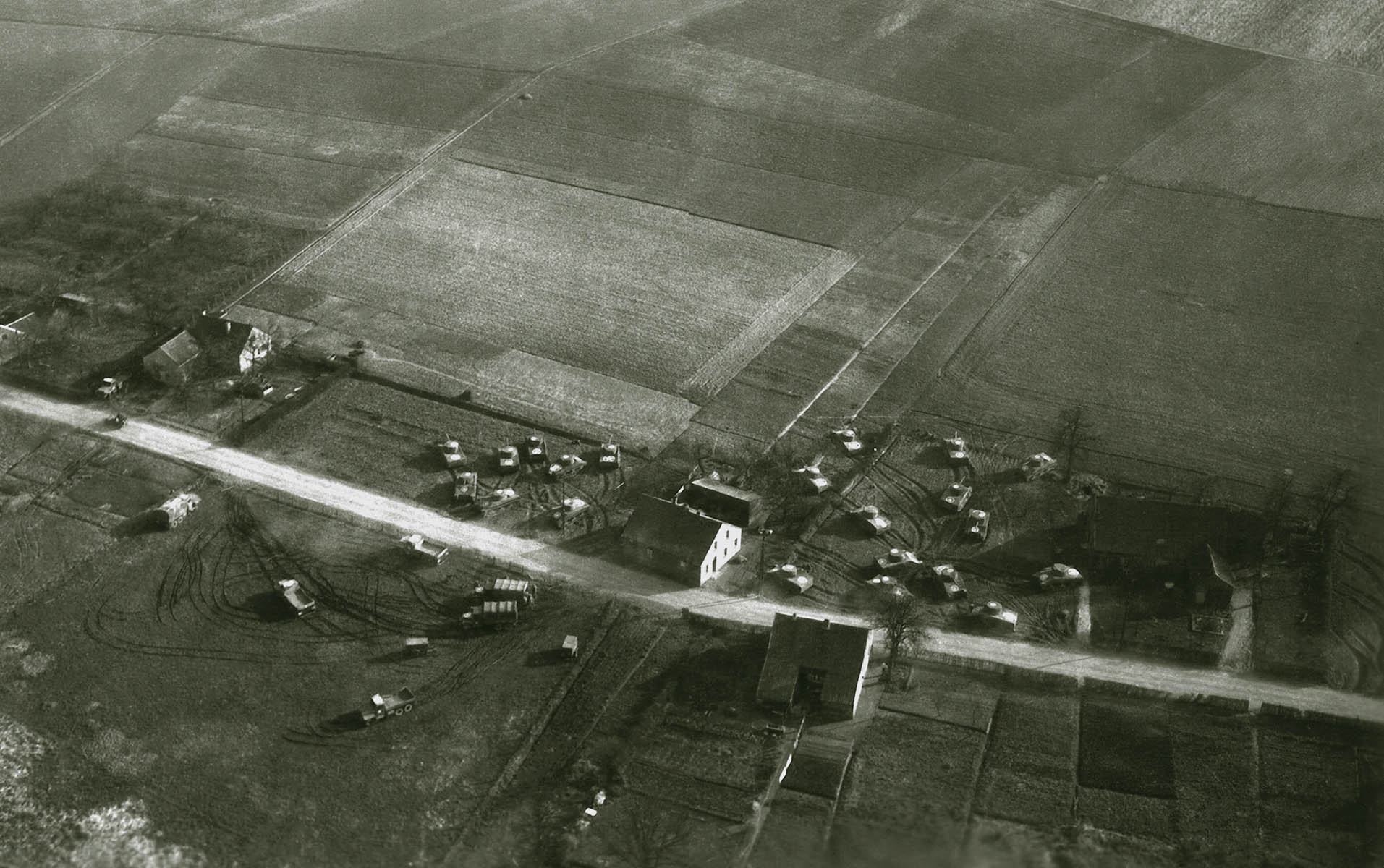 Inflatable dummy tanks and trucks set up near the Rhine River in Germany 1945 - photo 1