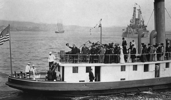 Former president Theodore Roosevelt waves to the New York crowds gathered to - photo 2