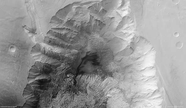 Fig 11 Hebes Chasma The region is an enclosed trough situated in Valles - photo 1