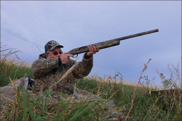 EDITORIAL DIRECTOR JAY CASSELL TRACKS AN INCOMING CANADA GOOSE FROM A LAYOUT - photo 8