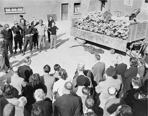 1 German civilians forced to wait in line to view the Buchenwald concentration - photo 5