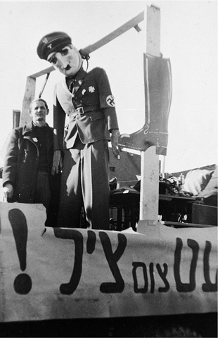 11 An effigy of Hitler during a Purim celebration Landsberg DP camp 12 - photo 15