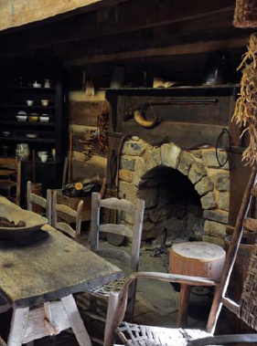 Dried britches beans hang both to the right and the left of the cobblestone - photo 1