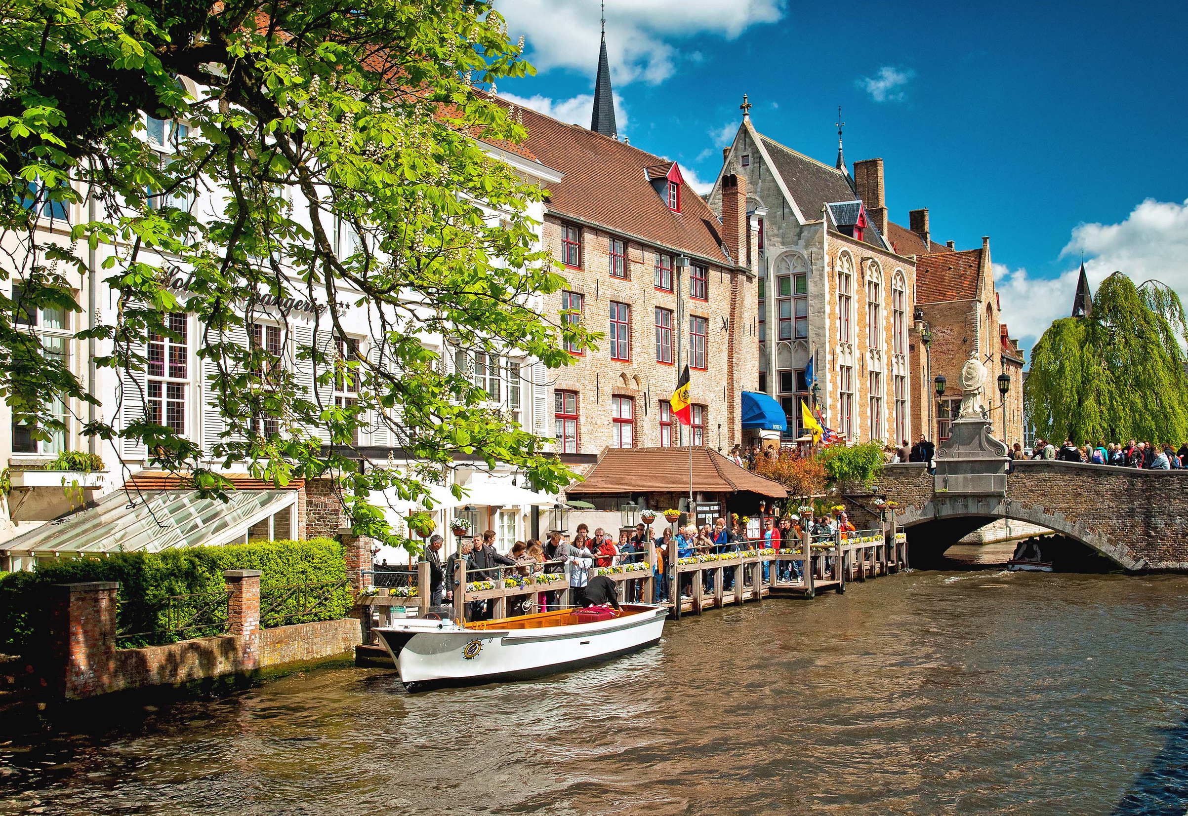 Canal scene Bruges Botond HorvathShutterstock Bruges and BrusselsTop - photo 5