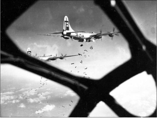 In close at the moment of weapon release A pair of 19th BG B-29s release their - photo 3