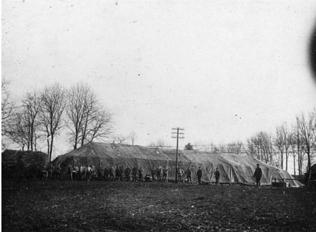 Not all barracks were permanent Here a large marquee to is being erected to - photo 4