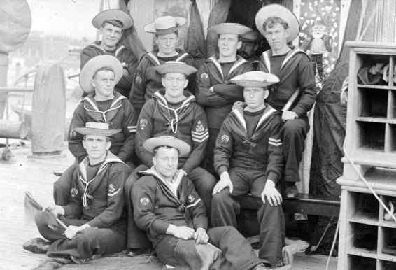 A group of visual signallers in No 1 uniform with Sennit hats pose for a - photo 4