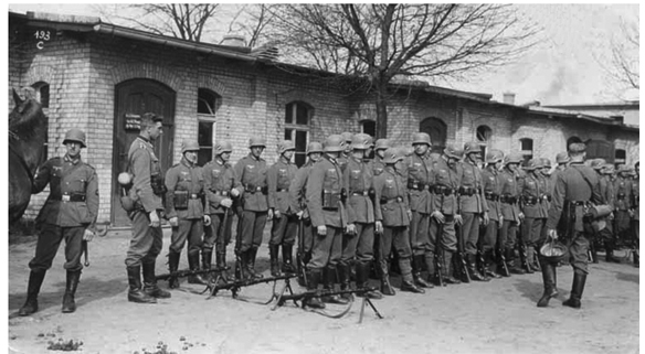 Prior to the attack on Poland in August 1939 German troops line-up for - photo 2