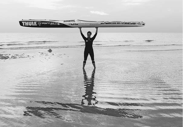 Freya Hoffmeister with the signature kayak she is using to paddle around South - photo 2