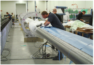 Production of a composite mast for a J-class yacht Stepping A mast is - photo 8