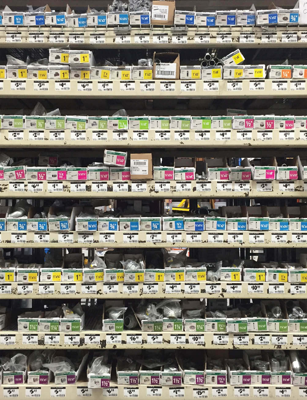 Standing at the hardware store looking at a wall of pipes and pipe pieces you - photo 3