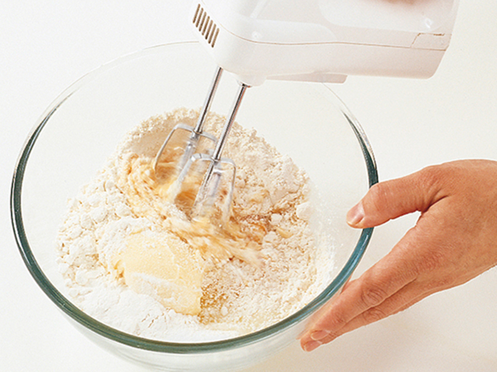 Put all the ingredients into a large bowl and beat together with a hand-held - photo 15