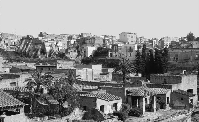 The Roman town of Herculaneum buried by volcanic eruption in AD 79 and above - photo 2