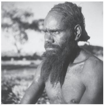 Signatory image of the Australian nomad dreadlocks tied back with twine woven - photo 2