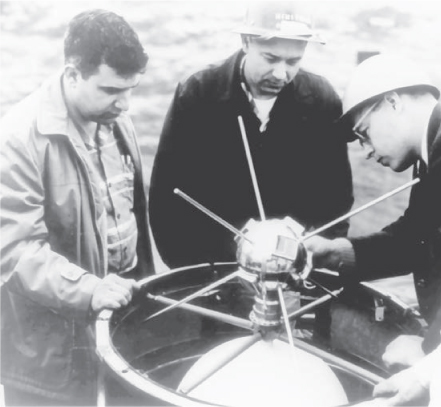 Solar panels with a purpose GPS pioneer Roger L Easton left inspects the - photo 2