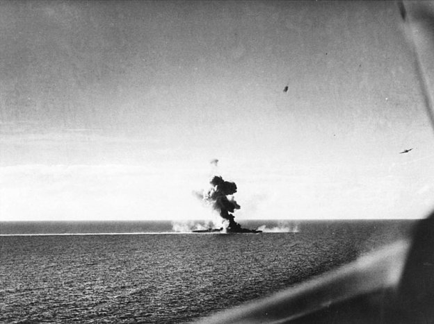 A Japanese cruiser under attack during the Battle of Leyte Gulf About - photo 1