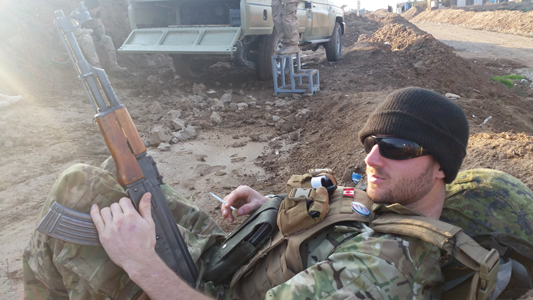 Taking a break at Rashad during a lull in the fighting Patrolling the - photo 16