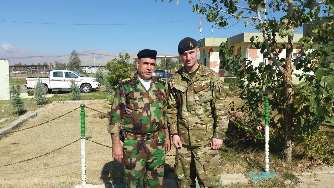 At the Peshmerga base in Sulaymaniyah shortly after my arrival I sported my - photo 5