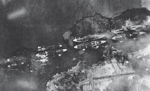 This Japanese photo shows six battleships of the Pacific Fleet under attack on - photo 9