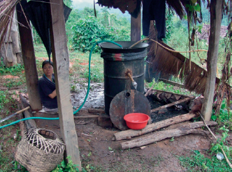 Woman moonshiner in a forest near Chiang Mai Thailand 2007 Though accurate - photo 5