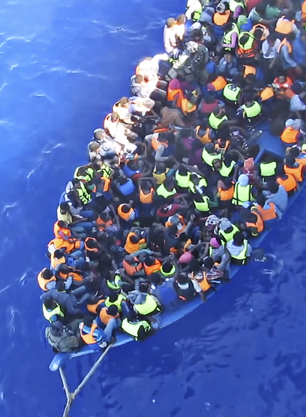 PERILOUS VOYAGE Water rescues of boats overloaded with migrants and refugees - photo 2