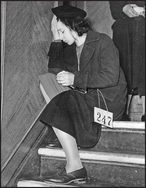 Image Credit Getty Images A young Jewish girl rests on a staircase shortly - photo 5