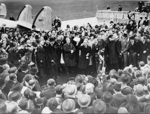 The famous picture of Neville Chamberlain waving the Munich agreement About - photo 1