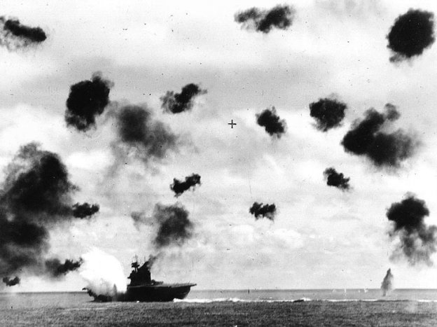 The USS Yorktown fighting during the Battle of Midway just as a torpedo - photo 1