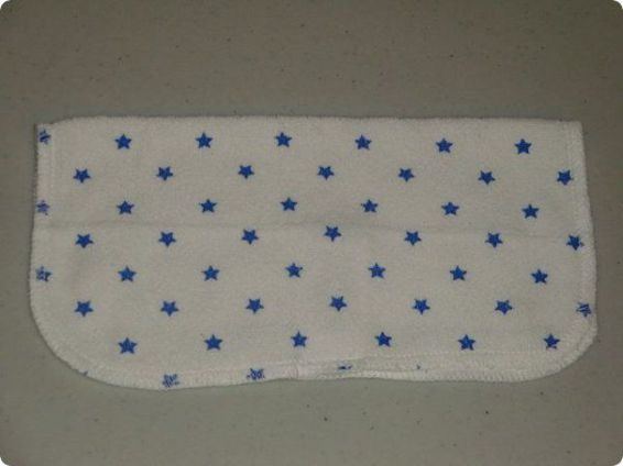 Take the baby washcloth that you have chosen for this project and fold it in - photo 2