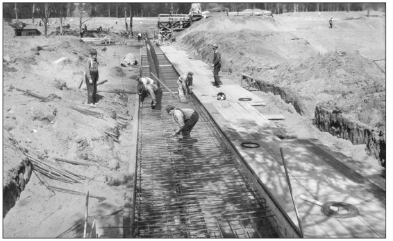 This 1936 photograph shows WPA workers laying the metal foundations for the - photo 8