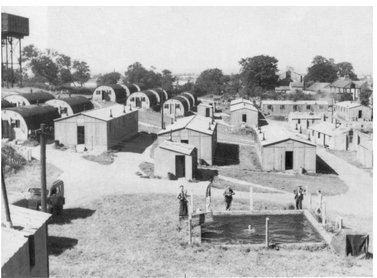 On the left the familiar water tower that dominates this group of buildings - photo 5