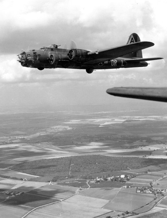 A B-17F Flying Fortress bomber of the 91st Bomb Group on a practice mission - photo 3