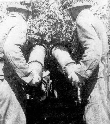 16 German troops loading a Nebelwerfer rocket launcher Private Collection - photo 18