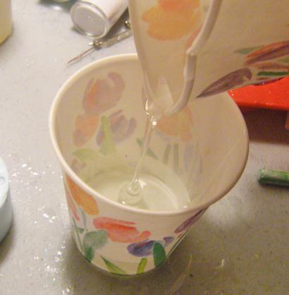 Once youve made a mark on both cups pour the hardener in one cup and the resin - photo 12