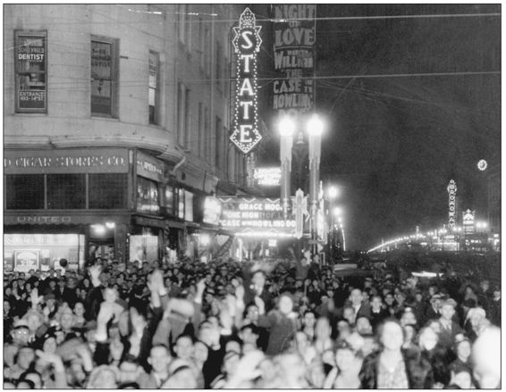 The neon clock over the Broadway Theatre at 1320 Broadway at right shows its - photo 1