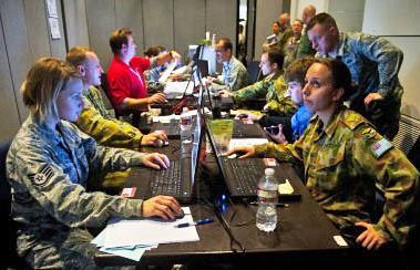 The RedFlag14-1CyberProtectionTeam worksoncyberdefense procedures inside the - photo 3