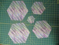 Repeat for all 15 of your fat quarters being sure to get two large hexagons - photo 10