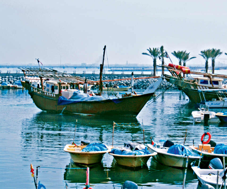 Old dhows and fishermen in Fahaheel Kuwait To understand food-sharing is to - photo 8