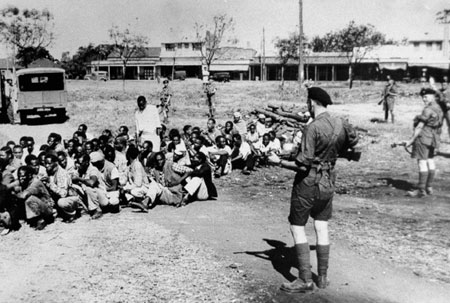 Suspects rounded up by British soldiers during a sweep through part of Nairobis - photo 24