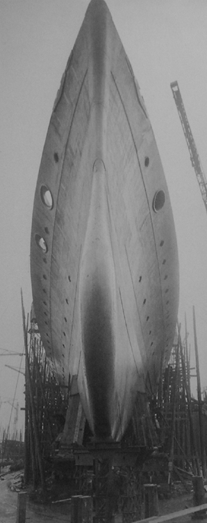 A dramatic view of the fine lines of the battlecruiser the forefoot of - photo 4