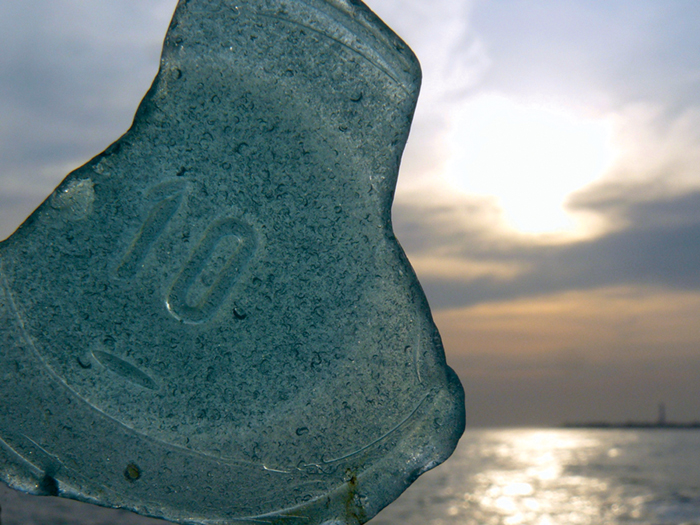 Rare citron-colored sea glass resembles seaweed on the beach This piece was - photo 15