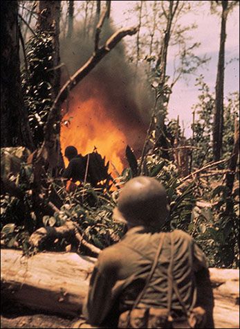 US SOLDIERS USING FLAME-THROWERS AND DYNAMITE TO BRING THE JAPANESE OUT OF - photo 3