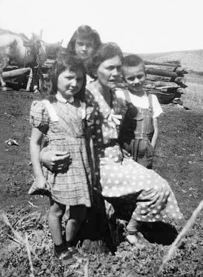 Libradita Tafoya Esquibel with her youngest children and a granddaughter - photo 6