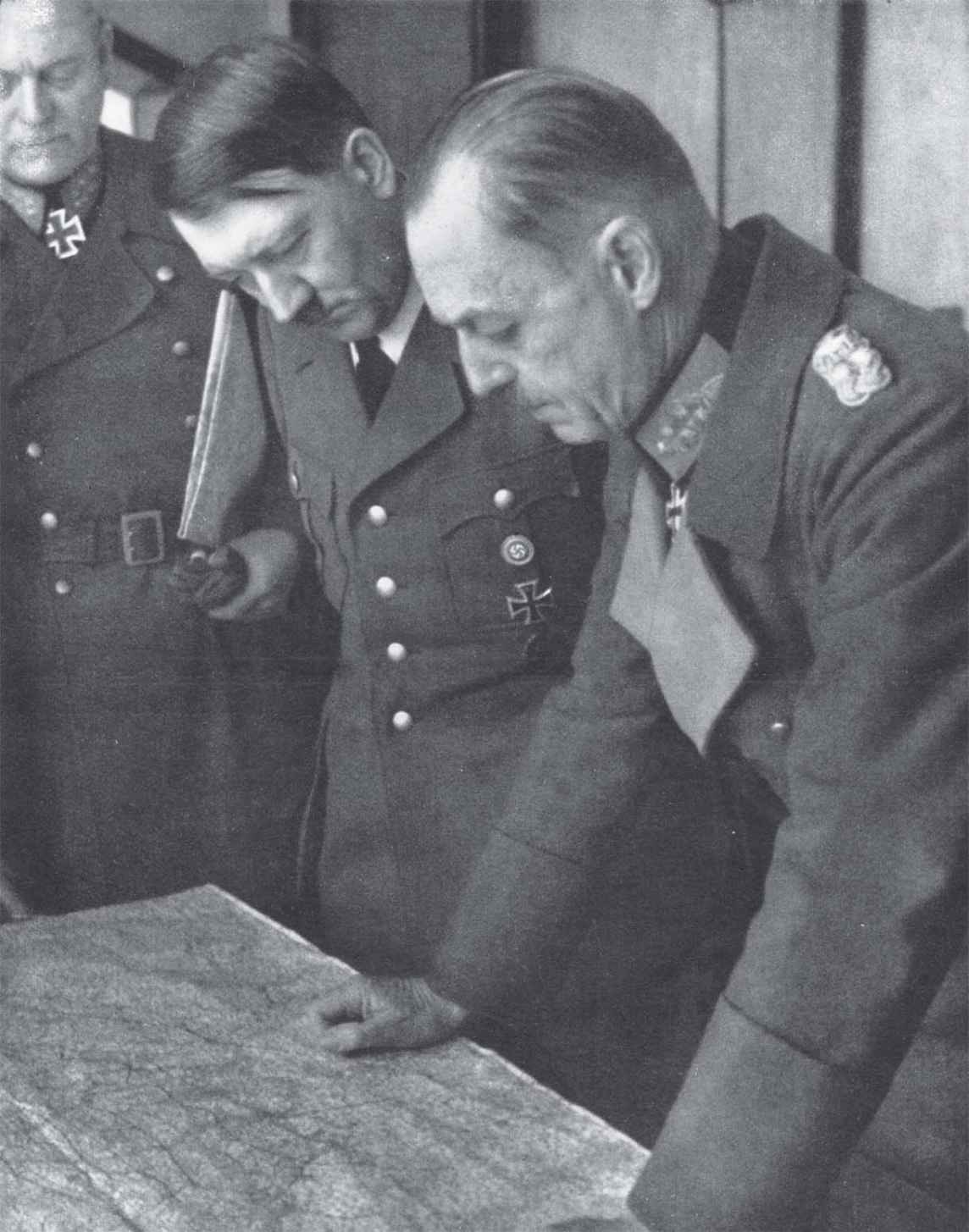 Generalfeldmarschall Karl Rudolf Gerd von Rundstedt delivers a report to the - photo 8