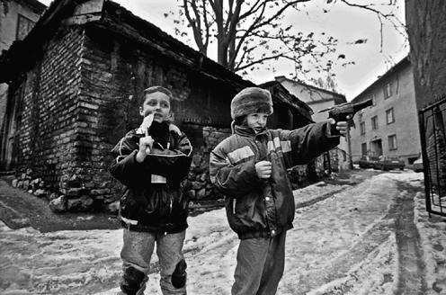 Boys at play set up a make-believe checkpoint on Logavina Street Children - photo 6