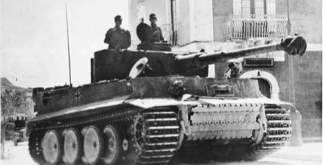 A Tiger I somewhere in Sicily 1943 with replacement treads mounted on the - photo 2