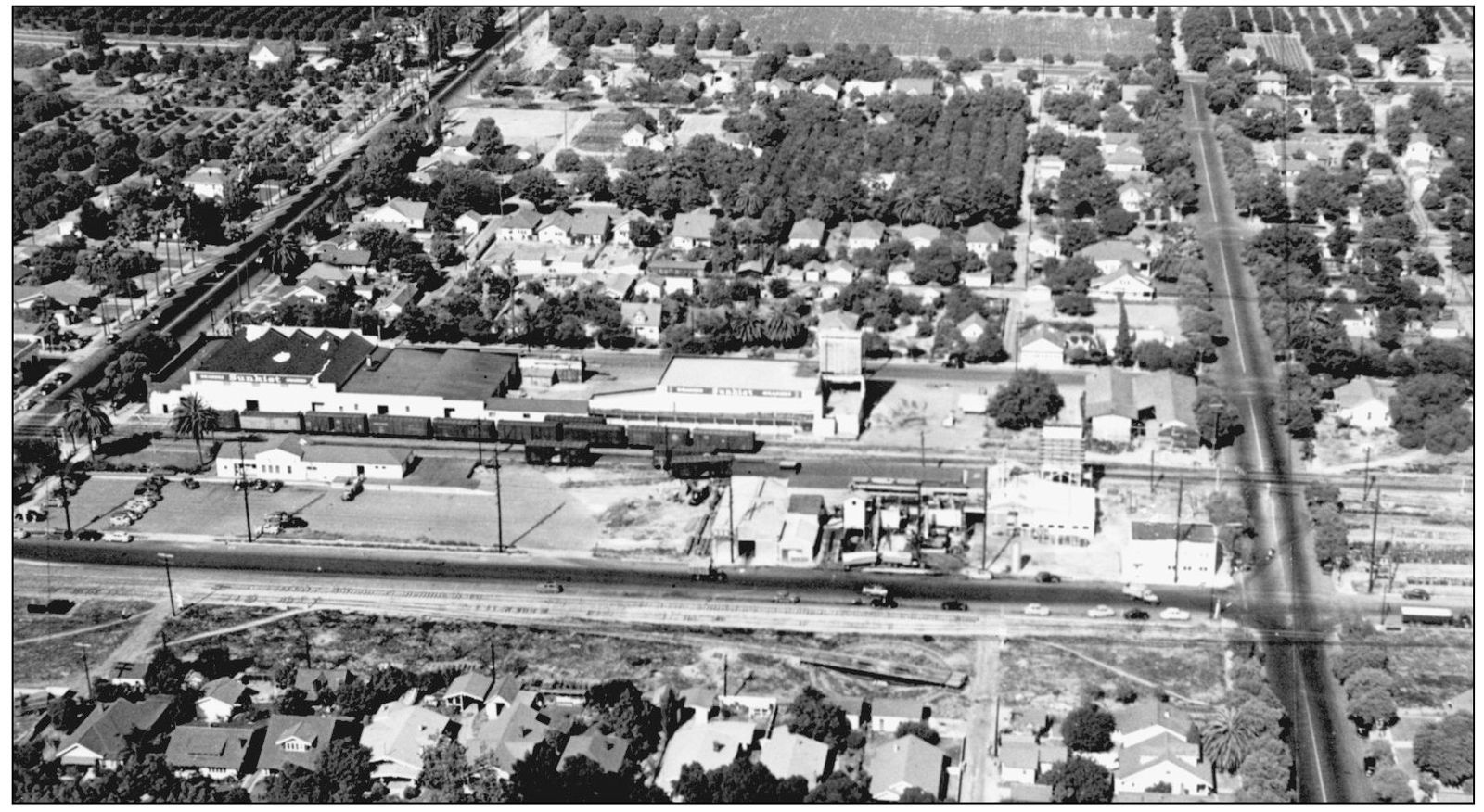 Looking east in this aerial view across Atchison Street between Center Street - photo 7